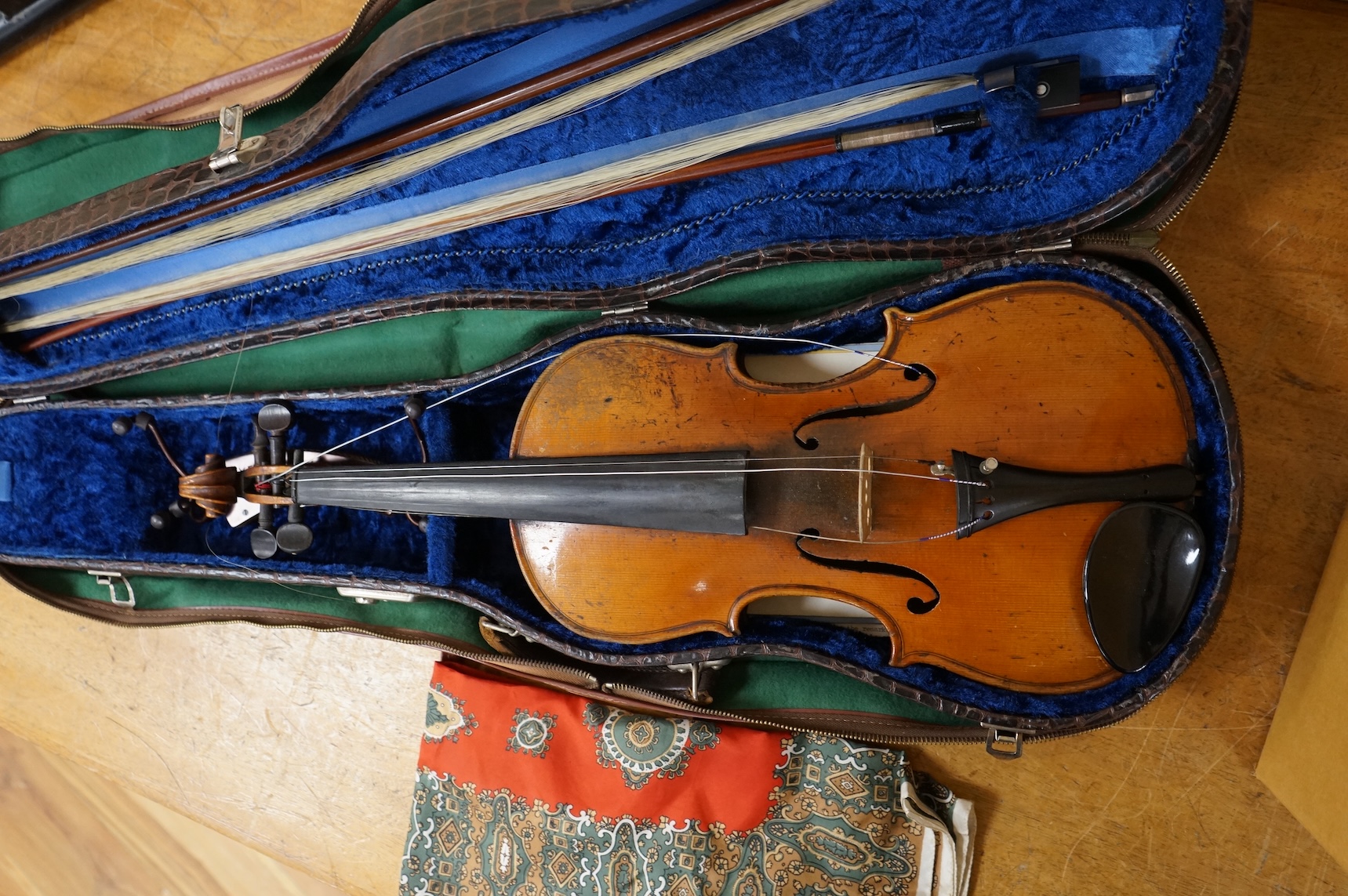 A cased late 19th century violin, Stradivarius copy, with two bows, one fully mounted and signed Roger Lotte, CITES Submission reference, RSF8HBLC